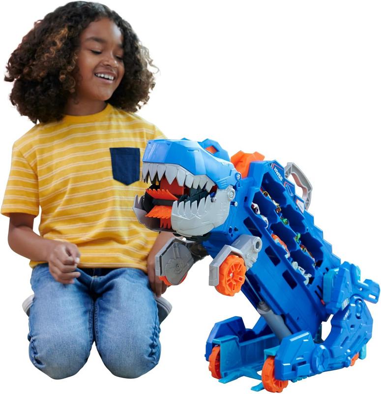 סט מסלול מכוניות צעצוע Hot Wheels City – מוביל דינוזואר T-Rex ענק